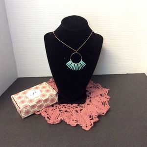 Plunder gold and turquoise color necklace.